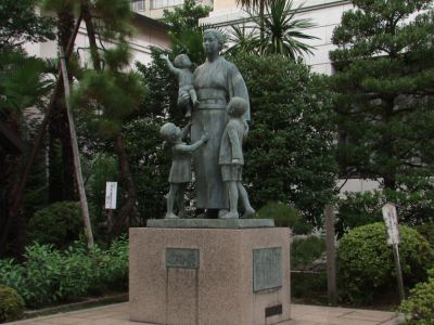 Statue of War Widow with Children