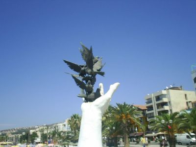 Pigeons in Hand Sculpture